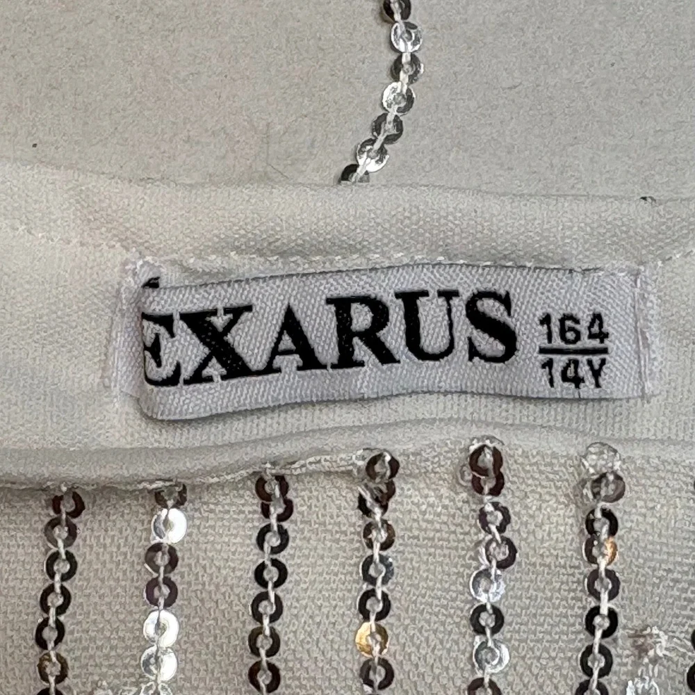 EXARUS Girls White Silver Sequin‎ Fringe Dress Feather Straps Size 14Y Hair Bow